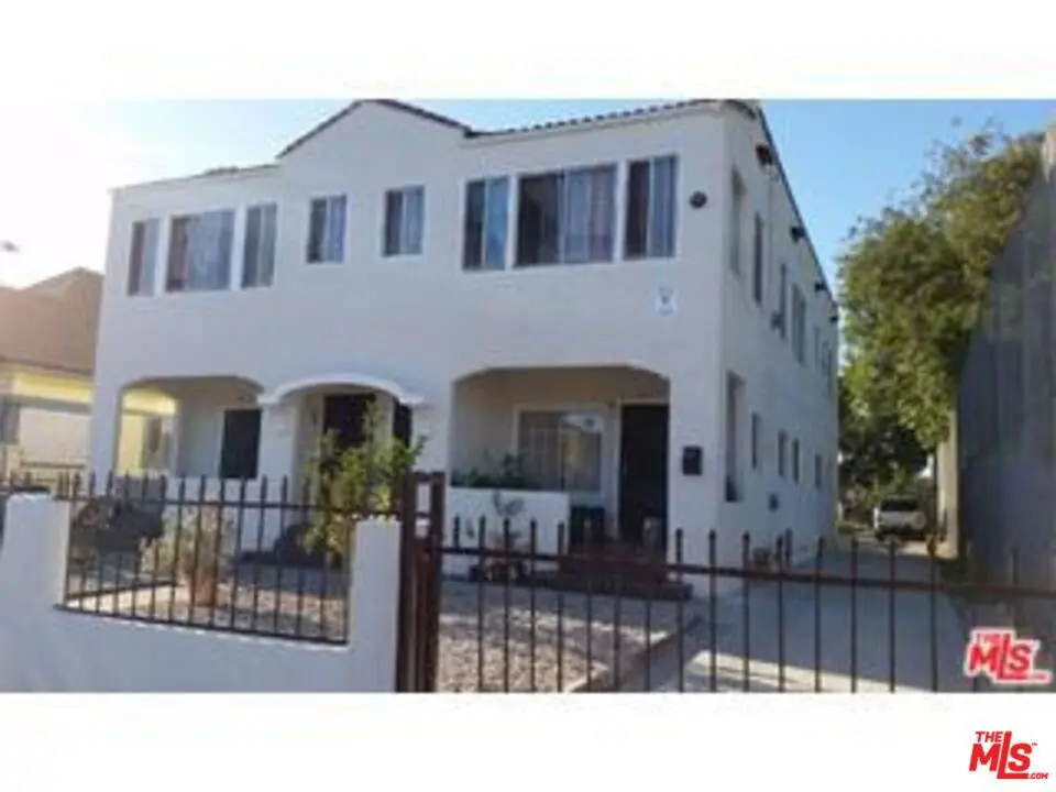 Residential Income for sale at 673 E 50th Street, Los Angeles, CA featuring 4 beds and 4 baths