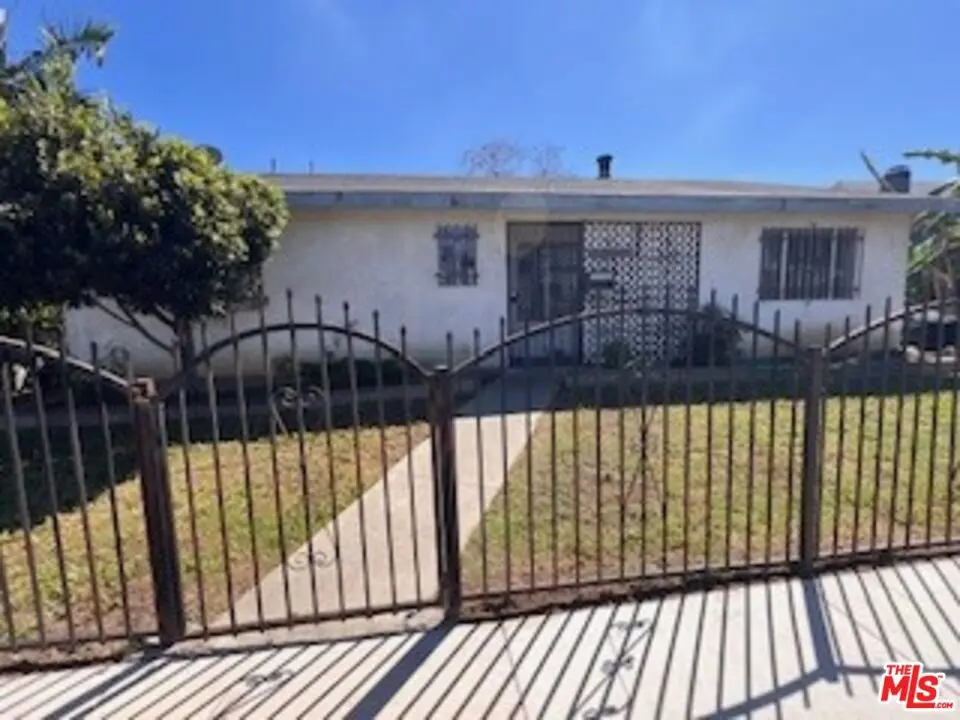 Single Family Residence for sale at 1036 W 109th Street, Los Angeles, CA featuring 3 beds and 2 baths