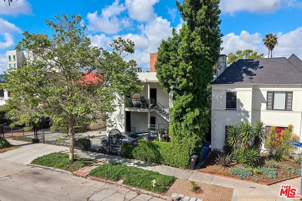 Residential Income for sale at 705 S Gramercy Place, Los Angeles, CA featuring 6 beds and 5 baths
