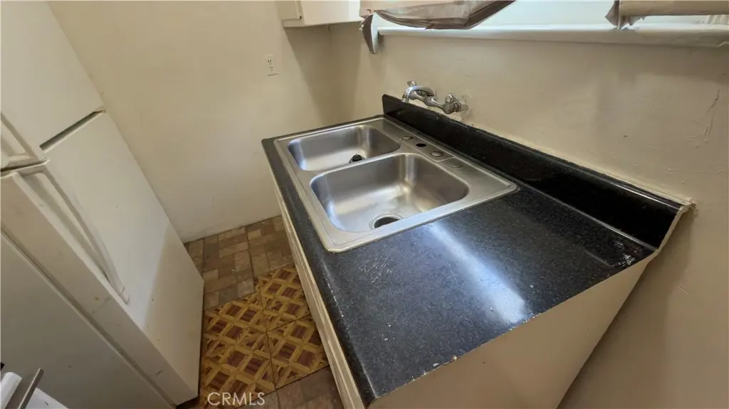 Triplex for sale at 1352 W 60th, Los Angeles, CA featuring 3 beds and 3 baths