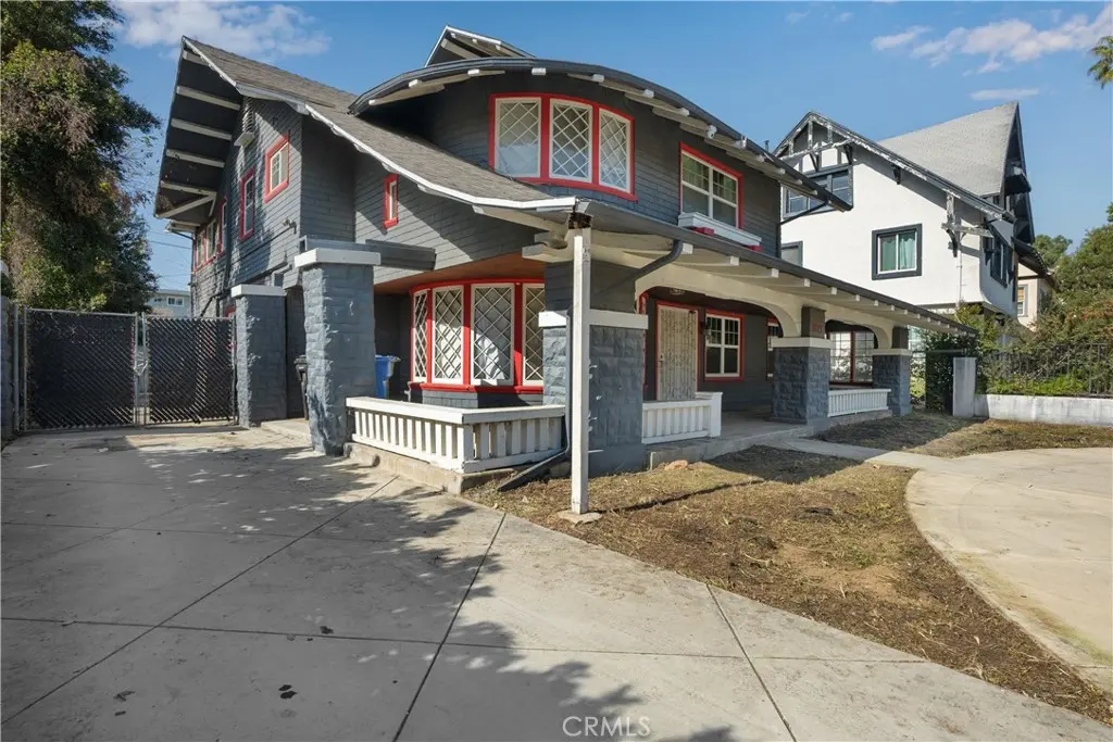 Single Family Residence for sale at 1527 S Wilton, Los Angeles, CA featuring 5 beds and 2 baths