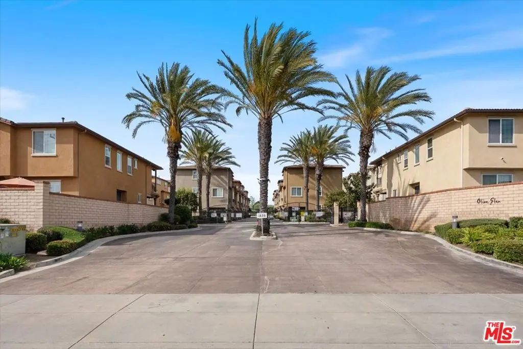 Townhouse for sale at 11926 Olive Glen Lane, Los Angeles, CA featuring 4 beds and 3 baths
