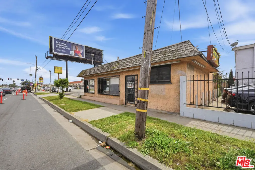 Single Family Residence for sale at 1021 W 101st Street, Los Angeles, CA featuring 2 beds and 2 baths