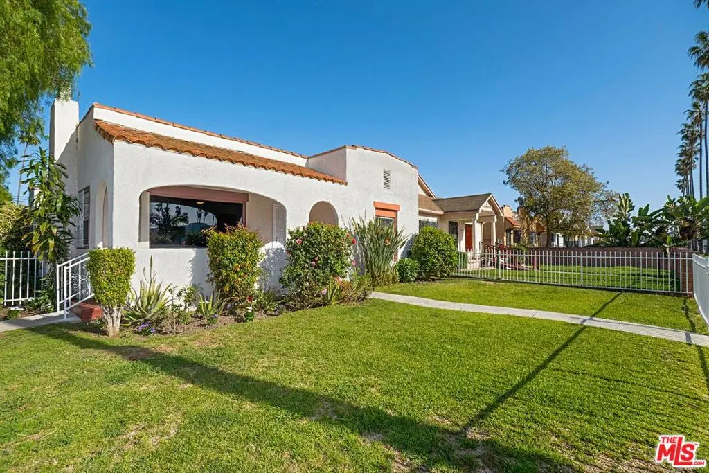 Residential Income for sale at 5700 S Gramercy Place, Los Angeles, CA featuring 4 beds and 3 baths
