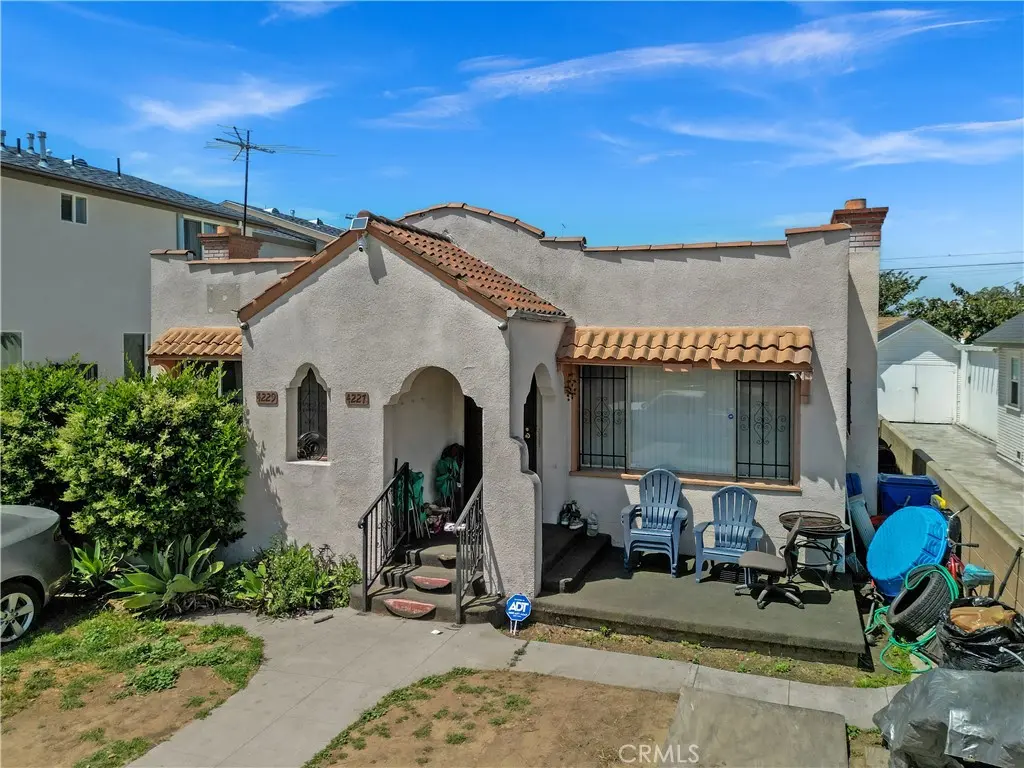 Duplex for sale at 4227 Walton Avenue, Los Angeles, CA featuring 4 beds and 3 baths