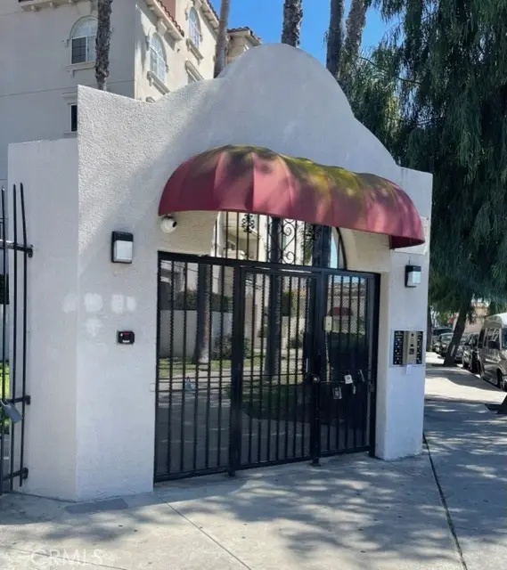 Condominium for sale at 7018 Rita Ave # 404, Huntington Park, CA featuring 3 beds and 2 baths