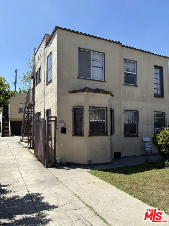 Apartment for rent at 1052 W 60th Place, Los Angeles, CA featuring 2 beds and 1 bath