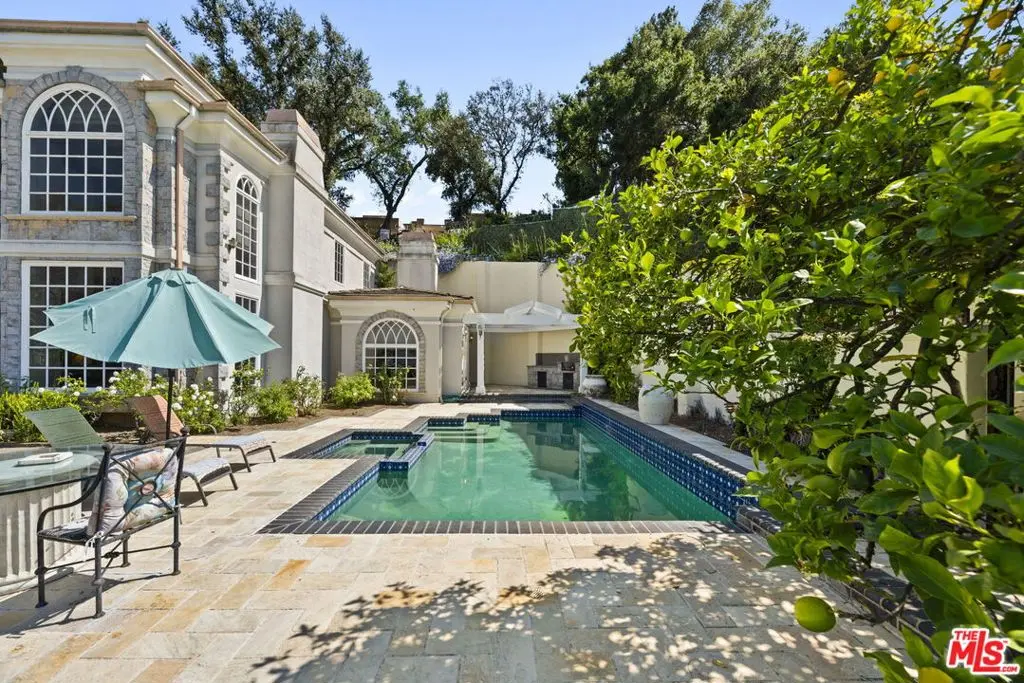 Single Family Residence for sale at 14330 Mulholland Drive, Los Angeles, CA featuring 5 beds and 5 baths