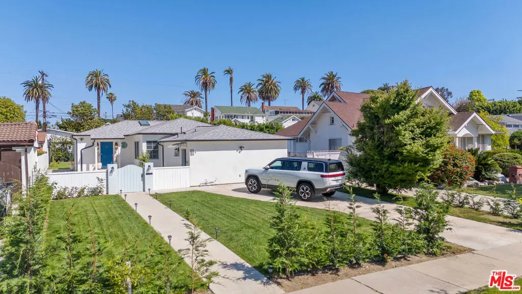 Single Family Residence for sale at 1152 S Windsor Boulevard, Los Angeles, CA featuring 5 beds and 4 baths