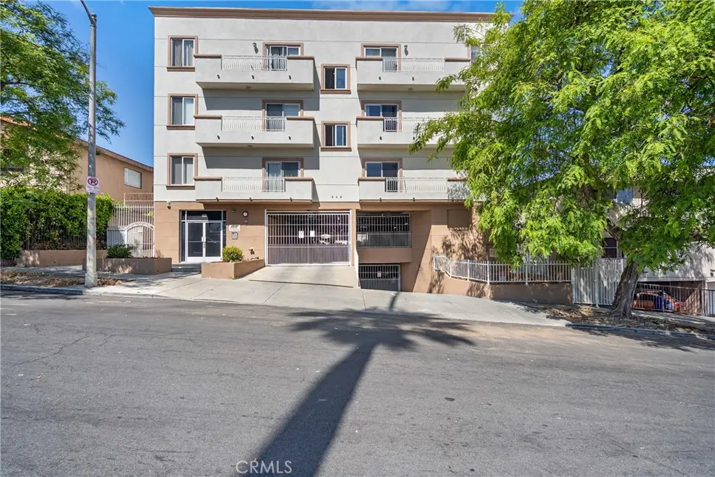 Condominium for sale at 949 S Manhattan Place 203, Los Angeles, CA featuring 3 beds and 2 baths