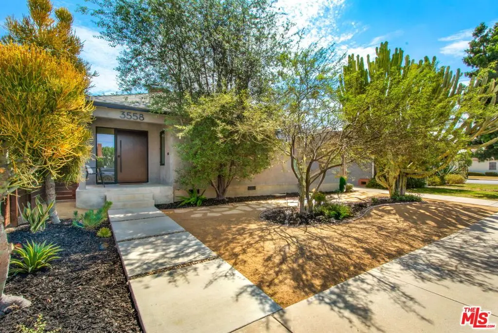 Single Family Residence for sale at 3558 S Muirfield Road, Los Angeles, CA featuring 3 beds and 2 baths