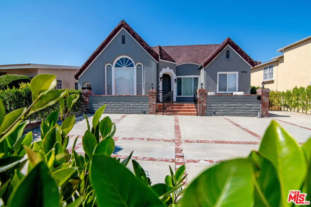 Single Family Residence for sale at 5761 W Olympic Boulevard, Los Angeles, CA featuring 4 beds and 4 baths