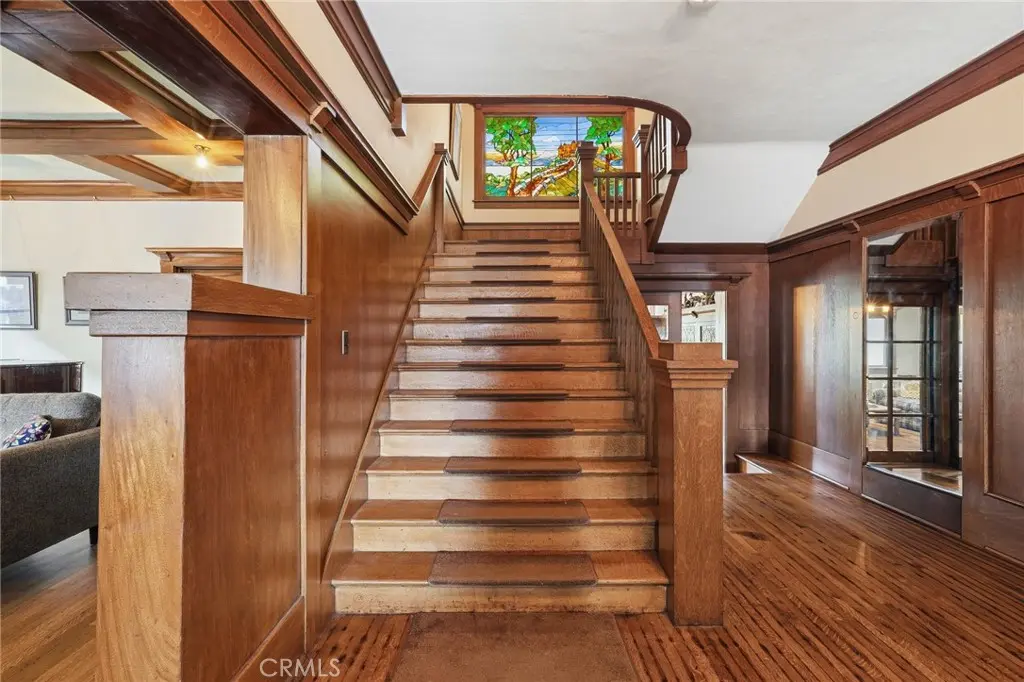 Single Family Residence for sale at 1415 S Manhattan Place, Los Angeles, CA featuring 9 beds and 5 baths