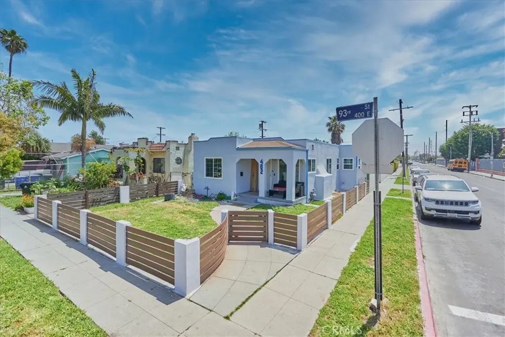 Single Family Residence for sale at 402 E 93rd Street E, Los Angeles, CA featuring 4 beds and 3 baths