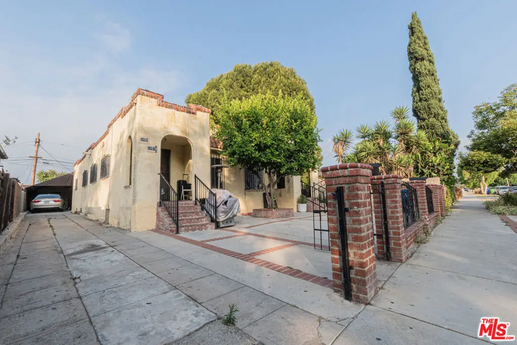 Residential Income for sale at 2855 W Avenue 34, Los Angeles, CA featuring 5 beds and 2 baths