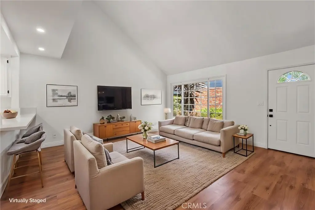 Townhouse for sale at 164 Brookline Lane, Costa Mesa, CA featuring 2 beds and 2 baths