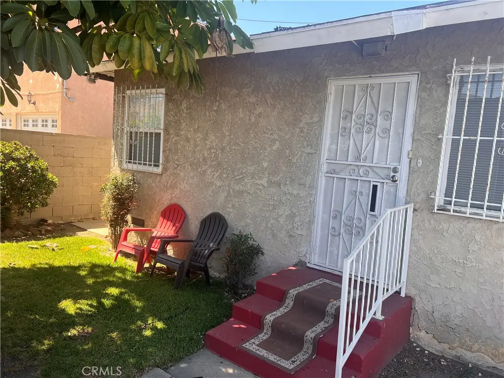 Duplex for sale at 1739 1741 W 105th Street, Los Angeles, CA featuring 5 beds and 3 baths