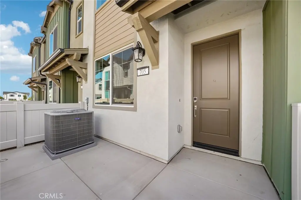 Condominium for sale at 9833 Crossbay Loop 705, Jurupa Valley, CA featuring 2 beds and 3 baths