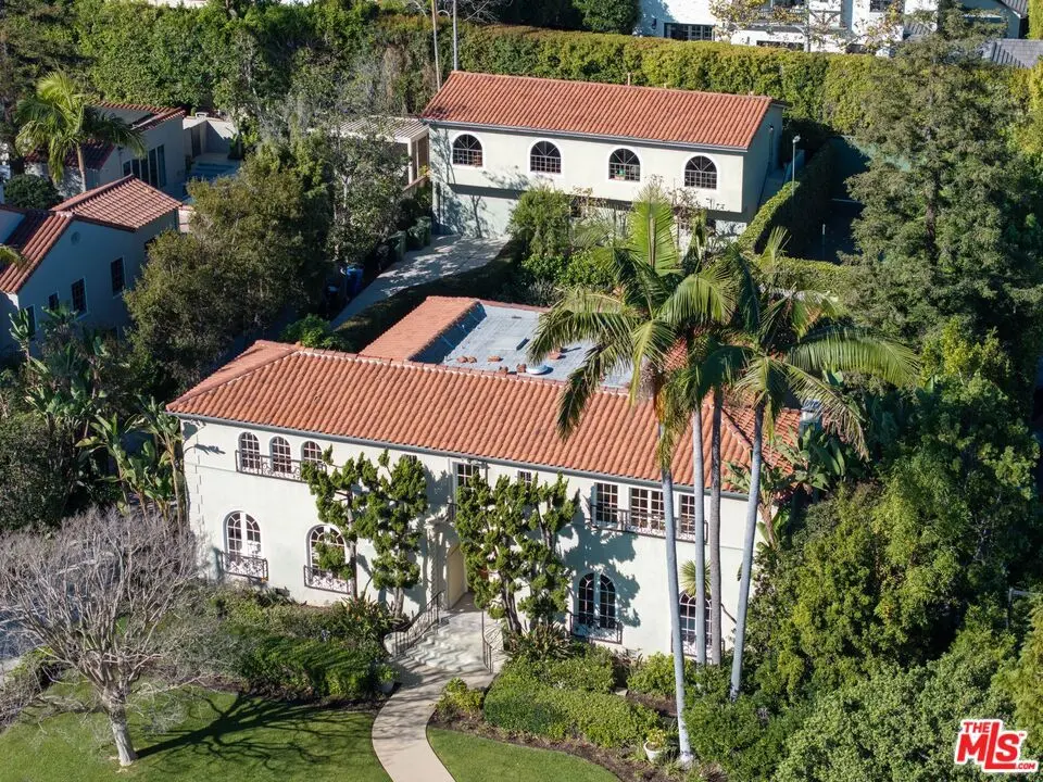 Single Family Residence for sale at 441 S Muirfield Road, Los Angeles, CA featuring 7 beds and 5 baths