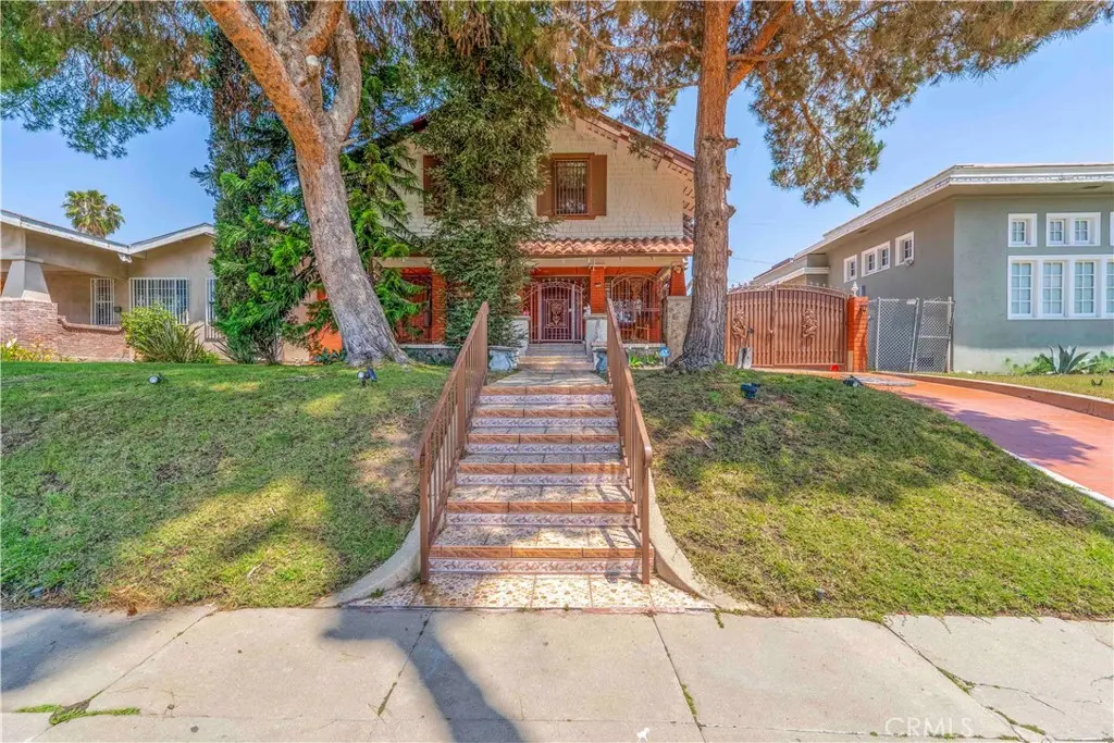 Single Family Residence for sale at 128 N St Andrews Place, Los Angeles, CA featuring 5 beds and 2 baths