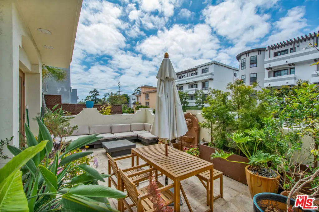 Condominium for sale at 11838 Kiowa Avenue 101, Los Angeles, CA featuring 2 beds and 2 baths
