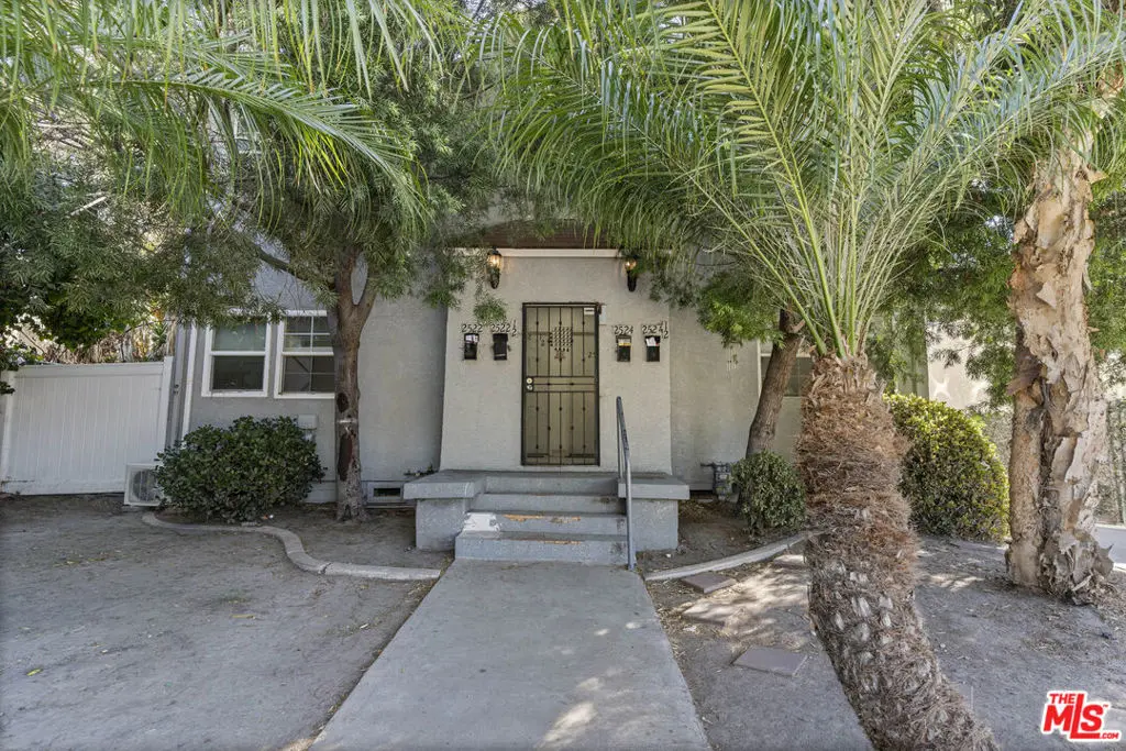 Residential Income for sale at 2522 S Dunsmuir Avenue, Los Angeles, CA featuring 8 beds and 4 baths