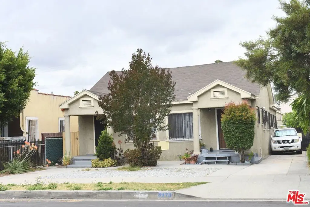 Residential Income for sale at 3973 S Van Ness Avenue, Los Angeles, CA featuring 4 beds and 2 baths