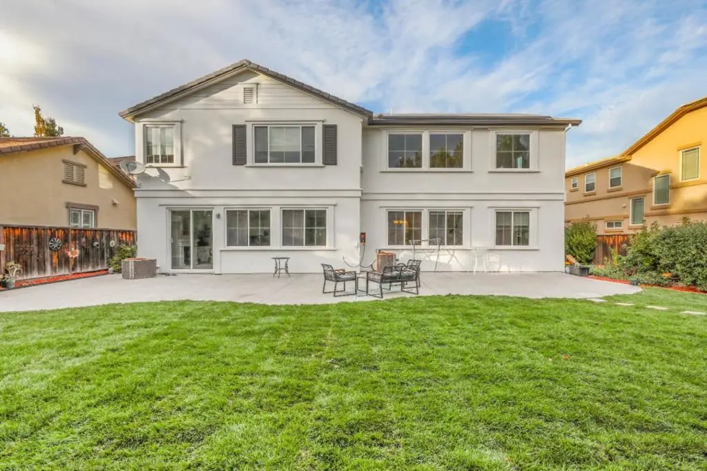 Single Family Residence for sale at 310 Ashlee Avenue, Tracy, CA featuring 4 beds and 4 baths