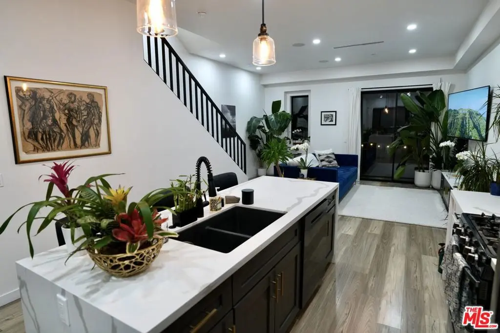 Single Family Residence for sale at 5961 Fountain Avenue, Los Angeles, CA featuring 2 beds and 4 baths