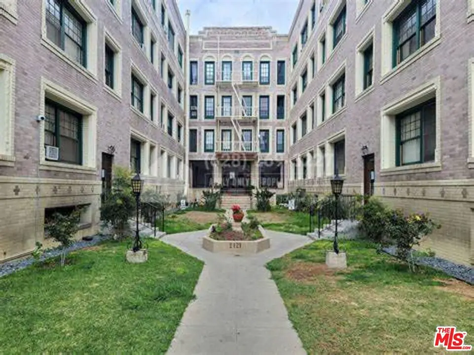 Condominium for sale at 2121 James M Wood Boulevard 409, Los Angeles, CA and 1 bath
