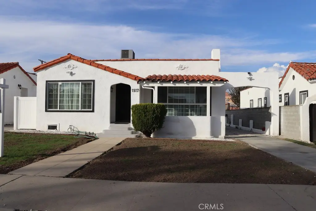Single Family Residence for sale at 1917 W 74th, Los Angeles, CA featuring 4 beds and 3 baths