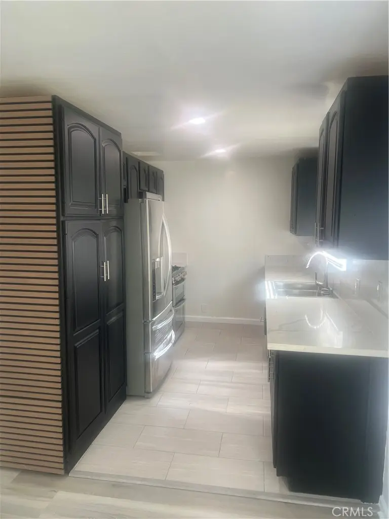 Condominium for sale at 7606 1/4 Crenshaw Boulevard, Los Angeles, CA featuring 1 bed and 1 bath