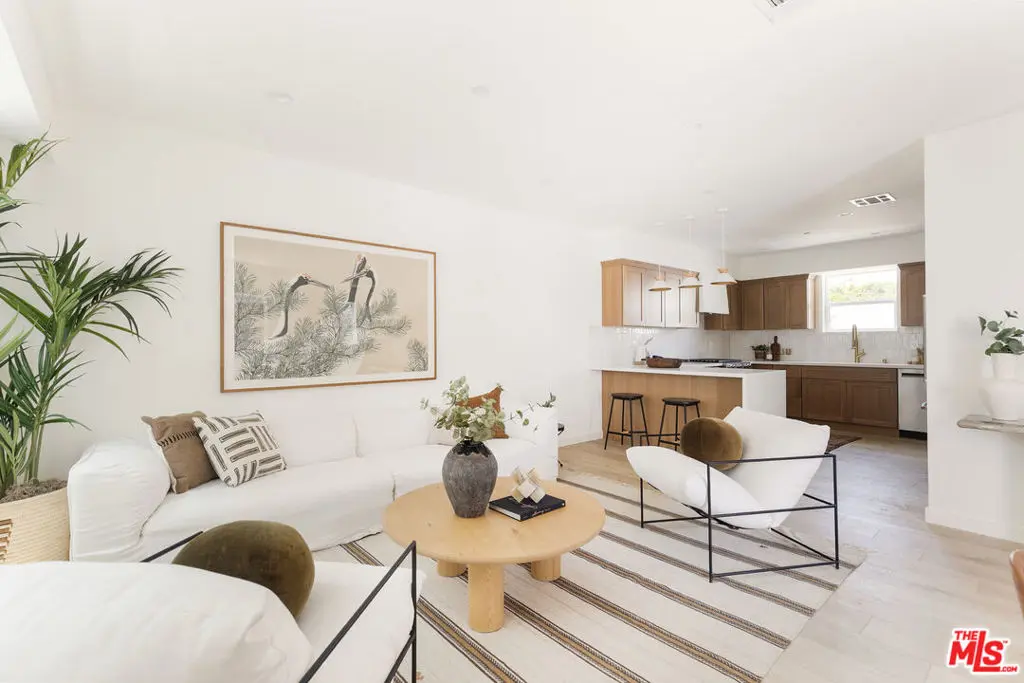 Townhouse for sale at 1233 N June Street, Los Angeles, CA featuring 4 beds and 5 baths