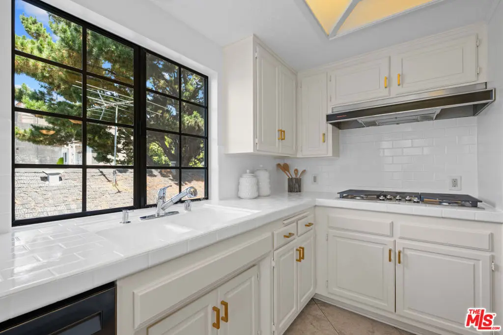 Condominium for sale at 10794 Wilkins Avenue 304, Los Angeles, CA featuring 2 beds and 3 baths