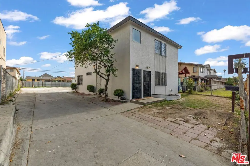 Residential Income for sale at 633 W 75th Street, Los Angeles, CA featuring 5 beds and 2 baths