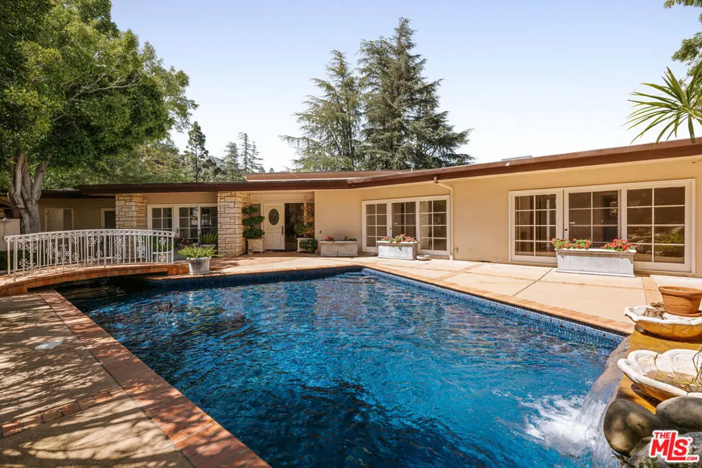 Single Family Residence for sale at 1743 Stone Canyon Road, Los Angeles, CA featuring 4 beds and 5 baths