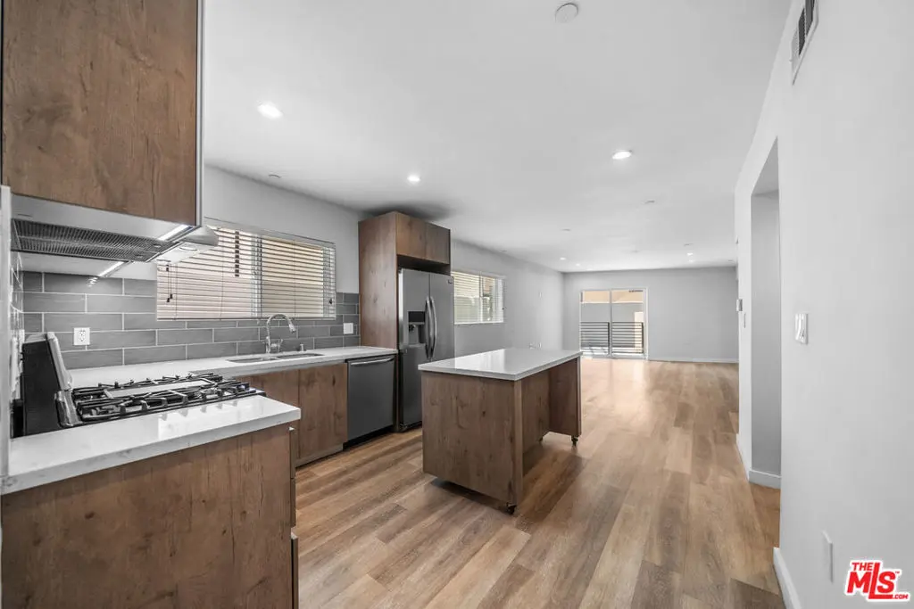 Residential Lease for rent at 8532 Cashio Street 101, Los Angeles, Los Angeles County, CA featuring 4 beds and 5 baths