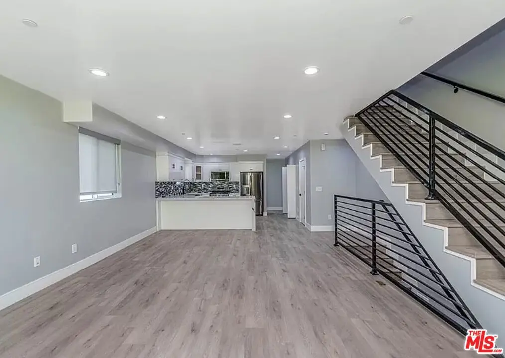 Townhouse for rent at 1947 N Vista Del Mar Avenue, Los Angeles, CA featuring 5 beds and 5 baths