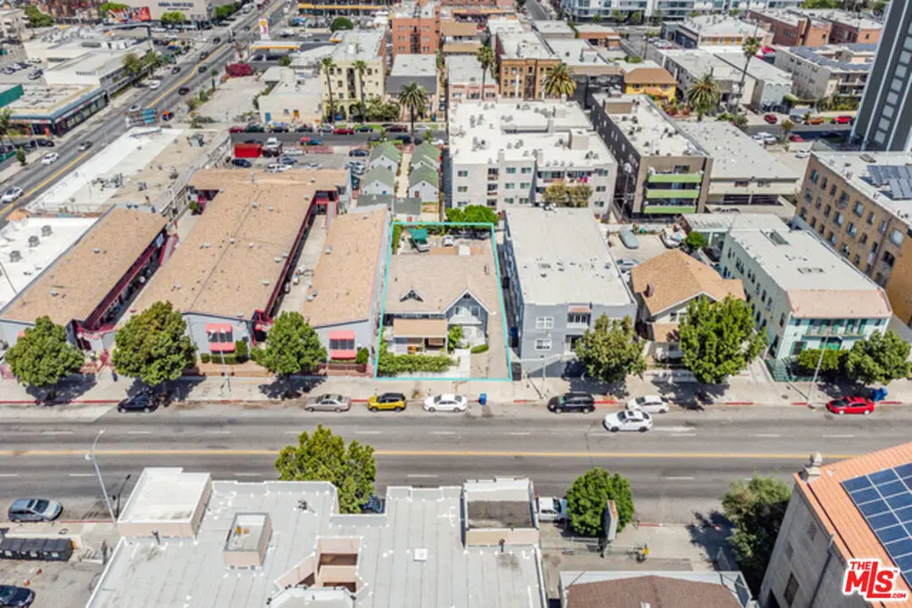 Single Family Residence for sale at 2961 W 8th Street, Los Angeles, CA featuring 6 beds and 2 baths