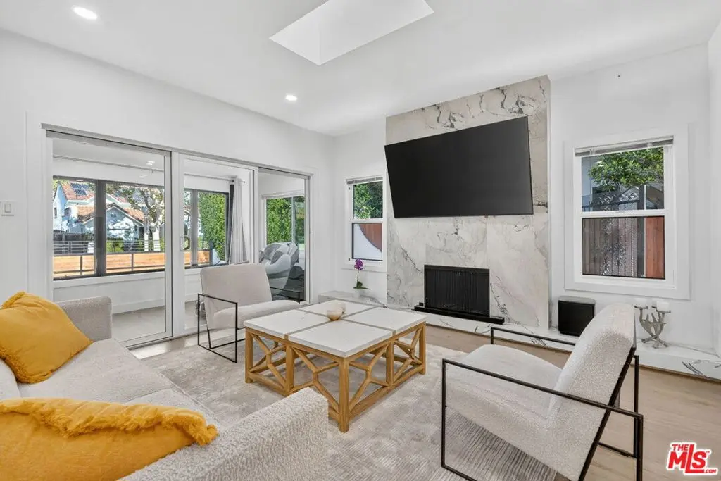 Single Family Residence for sale at 313 S Sycamore Avenue, Los Angeles, CA featuring 5 beds and 5 baths