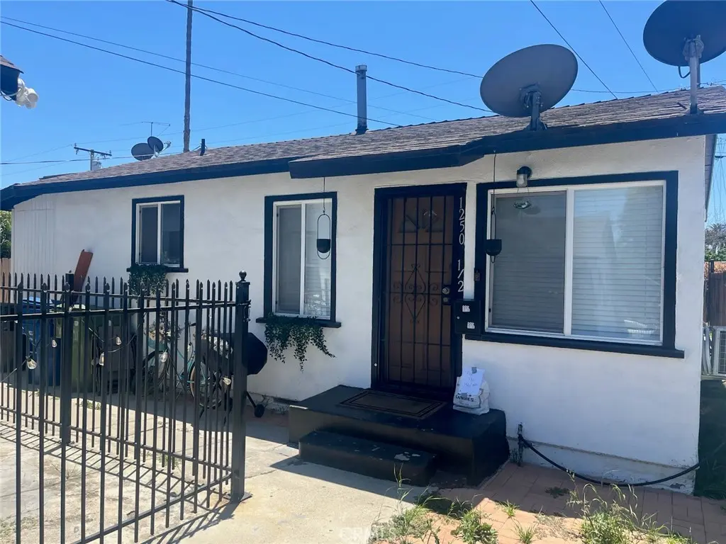 Single Family Residence for sale at 1250 1/2 W 87th, Los Angeles, CA featuring 2 beds and 2 baths