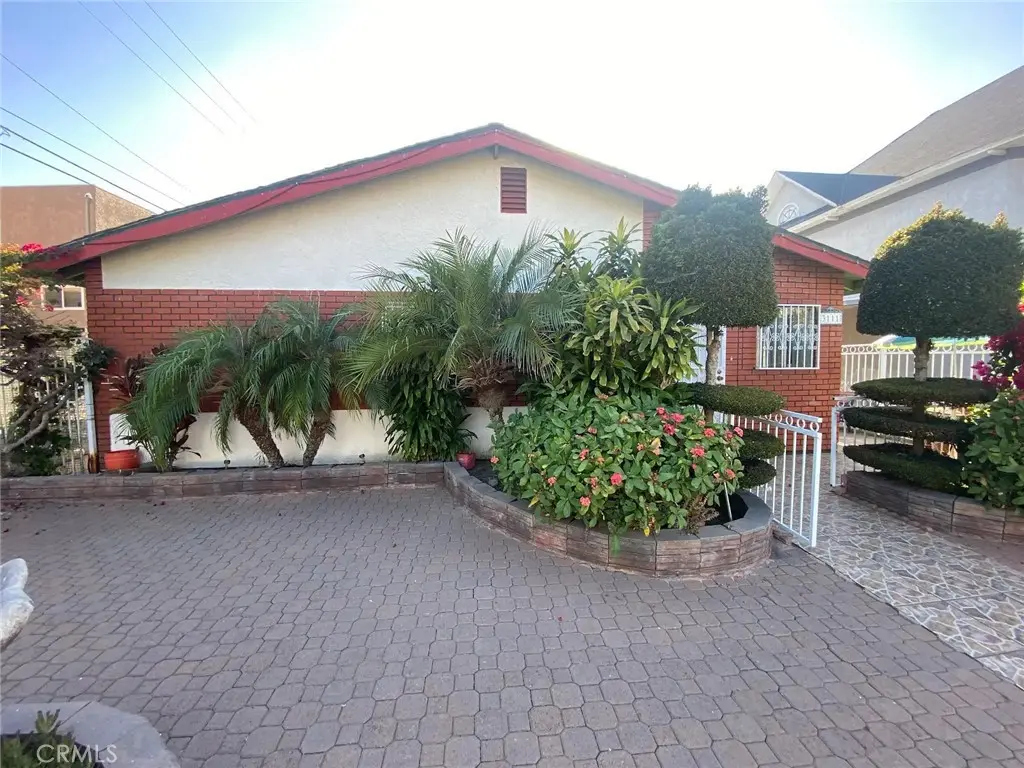Single Family Residence for sale at 3111 Halldale Ave., Los Angeles, CA featuring 4 beds and 2 baths