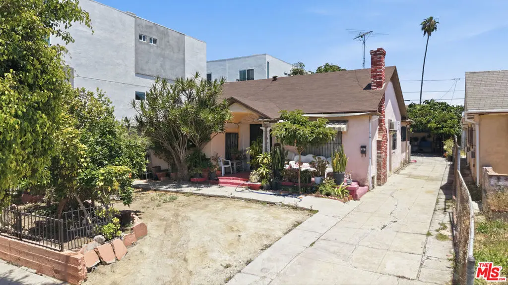 Single Family Residence for sale at 472 N Oxford Avenue, Los Angeles, CA featuring 4 beds and 3 baths