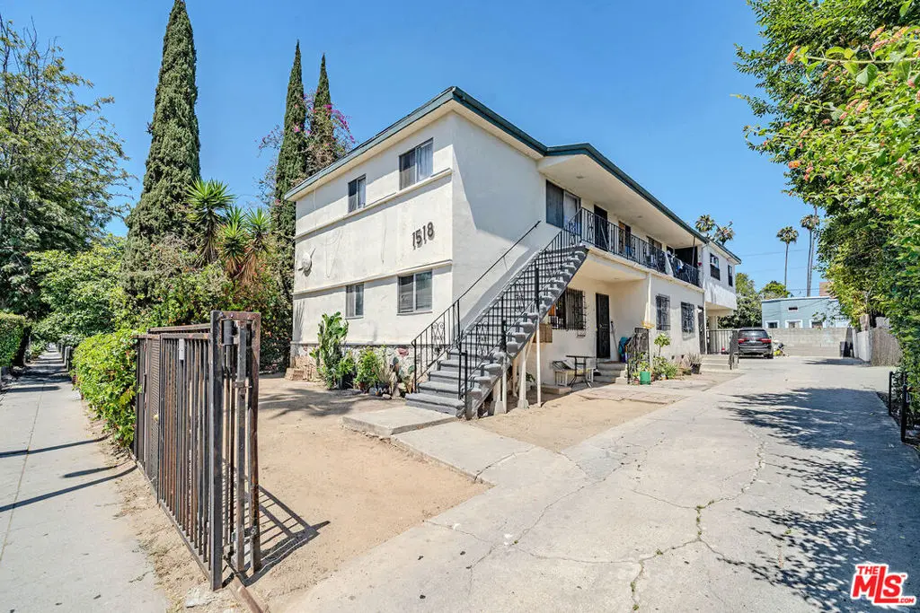Residential Income for sale at 1518 S Hobart Boulevard, Los Angeles, CA featuring 7 beds and 5 baths