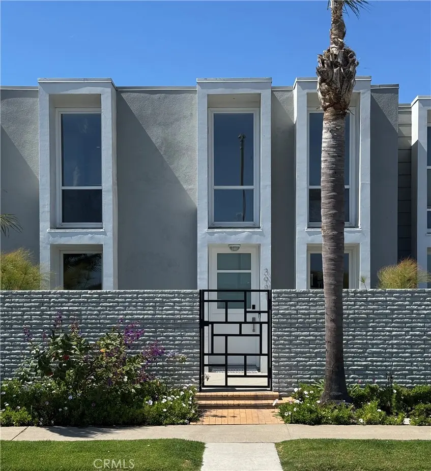 Townhouse for sale at 3981 Warner Avenue, Huntington Beach, CA featuring 3 beds and 3 baths