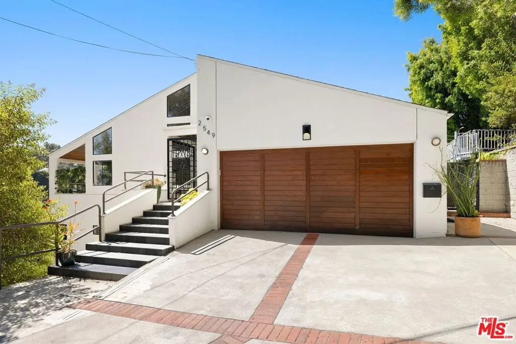 Single Family Residence for sale at 2549 Canyon Oak Drive, Los Angeles, CA featuring 4 beds and 4 baths