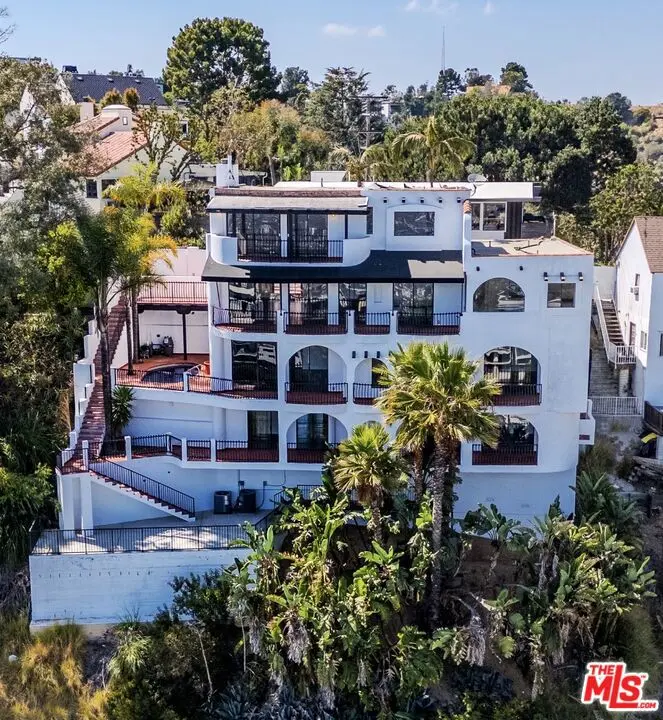 Single Family Residence for sale at 8908 Appian Way, Los Angeles, CA featuring 5 beds and 7 baths