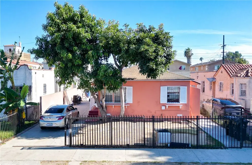 Triplex for sale at 1214 W 85th Street, Los Angeles, CA featuring 4 beds and 3 baths