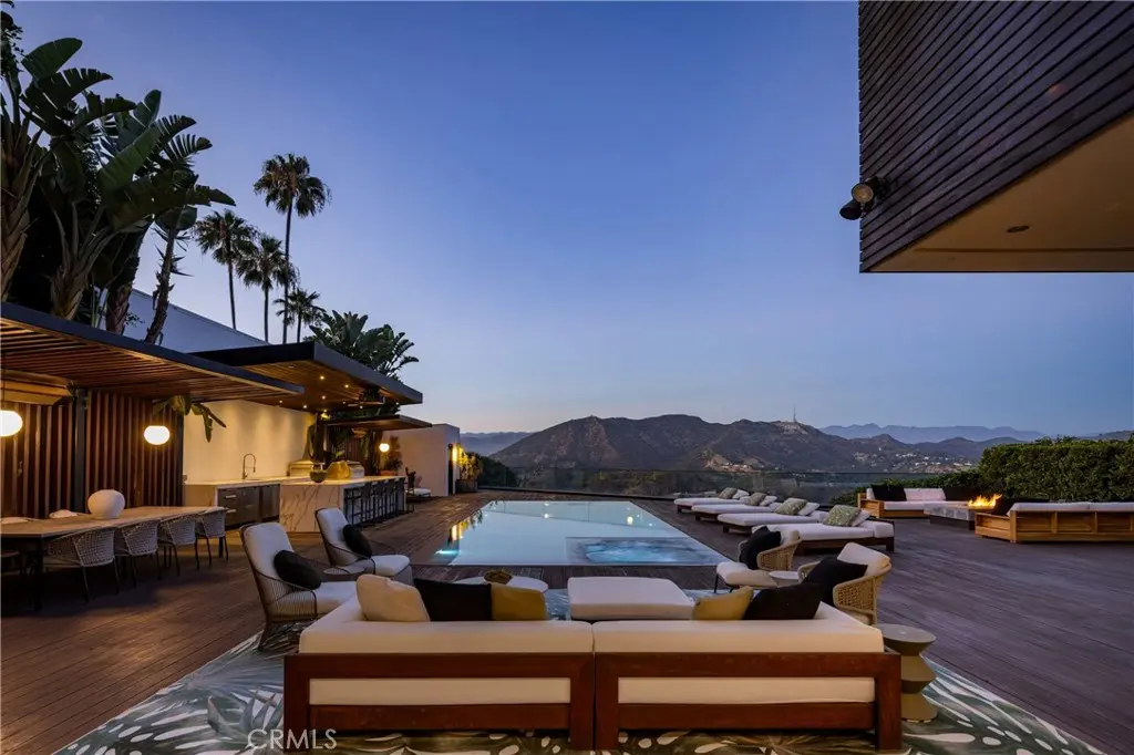 Single Family Residence for sale at 7107 Macapa Drive, Los Angeles, CA featuring 6 beds and 9 baths