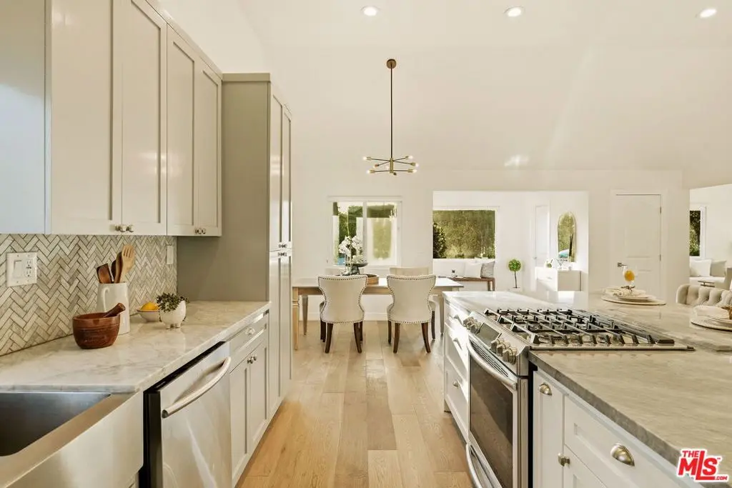 Single Family Residence for rent at 1026 S Windsor Boulevard, Los Angeles, CA featuring 3 beds and 4 baths